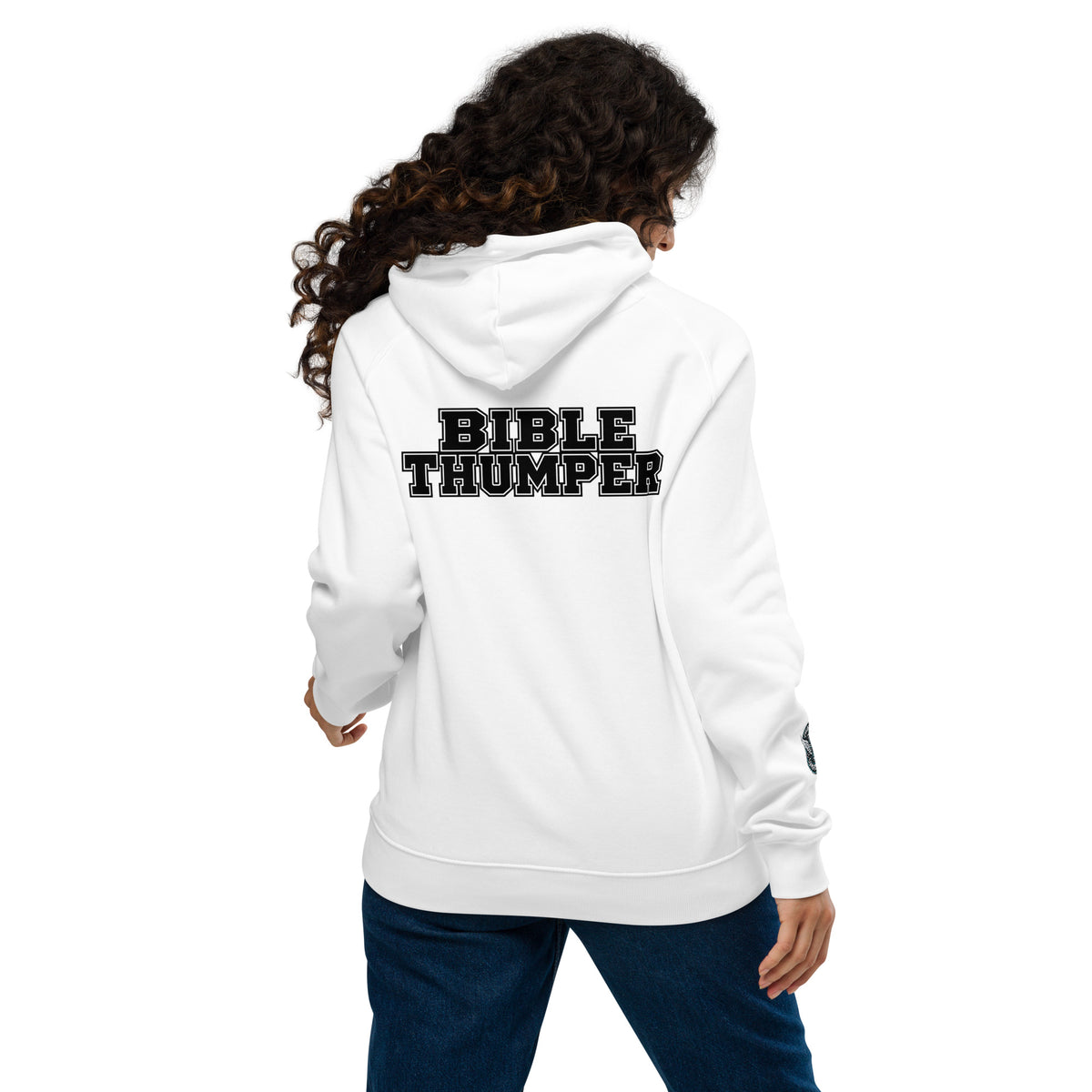 Woman wearing a white Bible Thumper hoodie from the back, showcasing the bold text design.